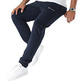 Champion Legacy Slim Fit Scrip Logo bestickte Manschettenhose "Navy"